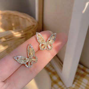 Butterfly stud earrings in gold